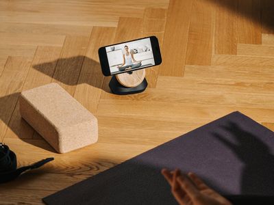 Yoga blocks and mat on a wooden floor